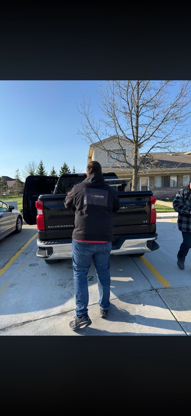 Appliance loaded into the truck for disposal in Southgate, MI